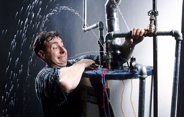 Plumbers Dilemma Image By David Bentley/corbis